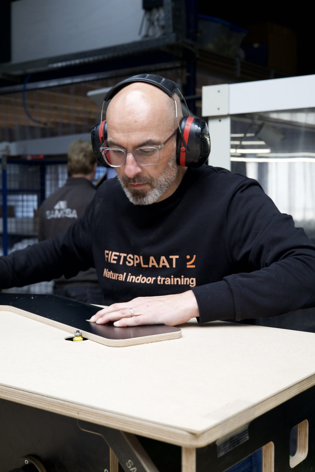 Plate being inspected by hand
